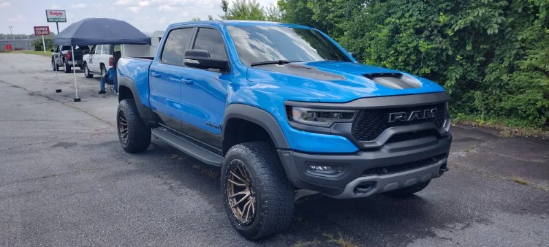 Blue Ram 1500 TRX on bronze wheels detailed by Grindtime Mobile Detailing