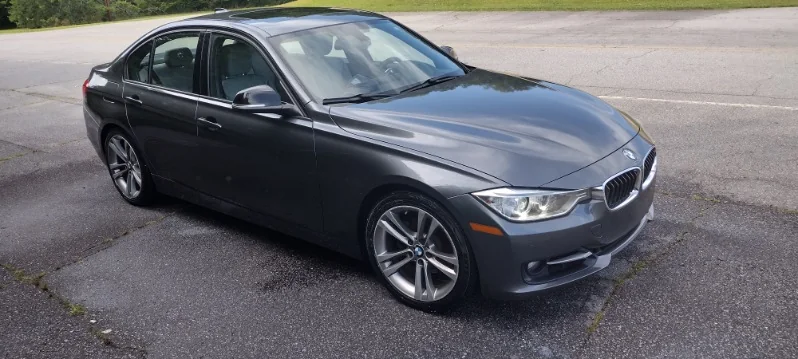 Gray BMW 3 Series polished up by Grindtime Mobile Detailing